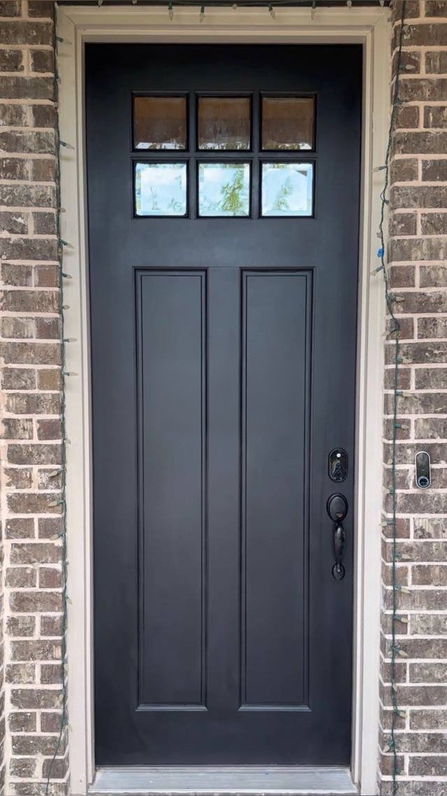 Front door after: smooth satin black finish